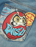 Jeans carrot-fit graffiti daruma EVISU