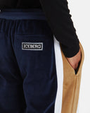 PANTALONI SPORTIVI UOMO MULTICOLOR IN CINIGLIA CON INSERTI A CONTRASTO E PATCH LOGATO